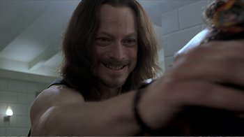 Movie still from “Reindeer Games” (2000), directed by John Frankenheimer – A person with long brown hair; Close Up shot, Low angle