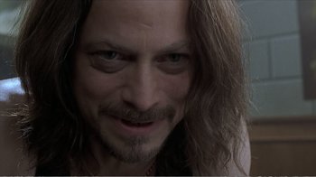 Movie still from “Reindeer Games” (2000), directed by John Frankenheimer – A person with long hair; Close Up shot, Low angle
