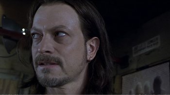 Movie still from “Reindeer Games” (2000), directed by John Frankenheimer – A person with long hair; Close Up shot, Over the shoulder angle