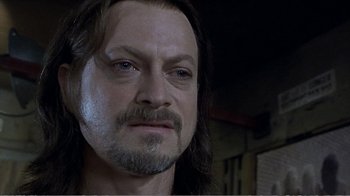 Movie still from “Reindeer Games” (2000), directed by John Frankenheimer – A person with long hair; Close Up shot, Over the shoulder angle