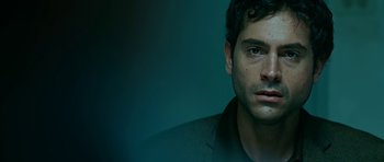 Movie still from “Rendition” (2007), directed by Gavin Hood – A person wearing a jacket; Close Up shot, Low angle