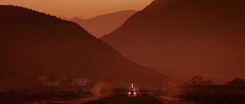 Movie still from “Rendition” (2007), directed by Gavin Hood – An airplane on a runway in the middle of the night; Extreme Wide shot, Low angle