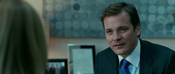 Movie still from “Rendition” (2007), directed by Gavin Hood – A person wearing a suit and tie; Close Up shot, Over the shoulder angle