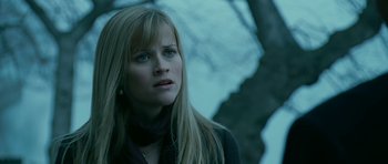 Movie still from “Rendition” (2007), directed by Gavin Hood – A person with long blonde hair; Close Up shot, Low angle