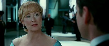 Movie still from “Rendition” (2007), directed by Gavin Hood – A person wearing a blue dress; Close Up shot, Over the shoulder angle