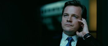 Movie still from “Rendition” (2007), directed by Gavin Hood – A man in a suit and a tie; Close Up shot, High angle
