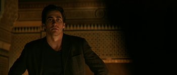 Movie still from “Rendition” (2007), directed by Gavin Hood – A person wearing a jacket; Medium shot, Low angle