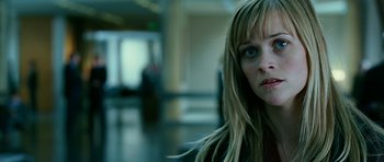 Movie still from “Rendition” (2007), directed by Gavin Hood – A person with long blonde hair; Close Up shot, Low angle
