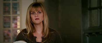 Movie still from “Rendition” (2007), directed by Gavin Hood – A person with long blonde hair; Close Up shot, Over the shoulder angle