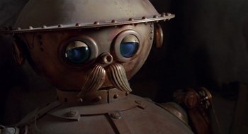 Movie still from “Return to Oz” (1985), directed by Walter Murch – The face of a robot with a mustache; Close Up shot, Low angle