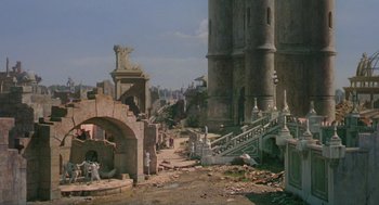 Movie still from “Return to Oz” (1985), directed by Walter Murch – An image of an ancient city with a castle in the background; Extreme Wide shot, High angle