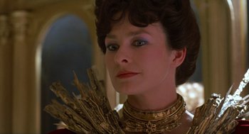 Movie still from “Return to Oz” (1985), directed by Walter Murch – A person wearing a costume; Close Up shot, Over the shoulder angle