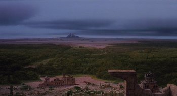 Movie still from “Return to Oz” (1985), directed by Walter Murch – A view of a mountain range from a distance; Extreme Wide shot, High angle