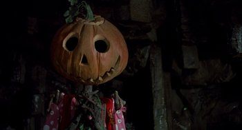 Movie still from “Return to Oz” (1985), directed by Walter Murch – A pumpkin head is hanging from a tree; Close Up shot, Low angle