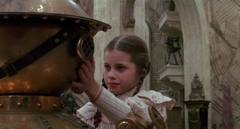 Movie still from “Return to Oz” (1985), directed by Walter Murch – A young girl touching the face of a man; Close Up shot, Over the shoulder angle