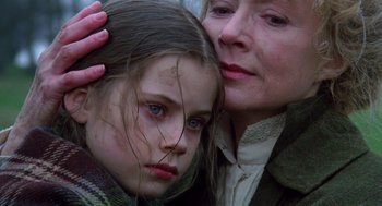 Movie still from “Return to Oz” (1985), directed by Walter Murch – A woman and a young girl are looking at the camera; Close Up shot, Over the shoulder angle