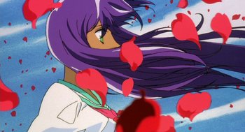 Movie still from “Revolutionary Girl Utena: The Movie” (1999), directed by Katsushi Sakurabi – A woman with long purple hair; Close Up shot, Low angle