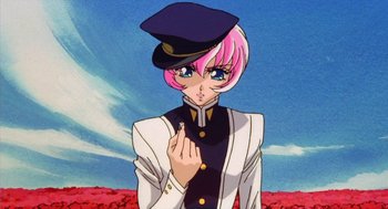 Movie still from “Revolutionary Girl Utena: The Movie” (1999), directed by Katsushi Sakurabi – A woman with pink hair wearing a uniform and a hat; Close Up shot, Low angle