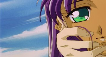Movie still from “Revolutionary Girl Utena: The Movie” (1999), directed by Katsushi Sakurabi – A person with purple hair and green eyes; Close Up shot, Low angle