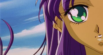 Movie still from “Revolutionary Girl Utena: The Movie” (1999), directed by Katsushi Sakurabi – View of a woman's face with long purple hair; Close Up shot, Low angle