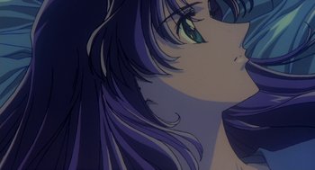 Movie still from “Revolutionary Girl Utena: The Movie” (1999), directed by Katsushi Sakurabi – View of a woman's face with purple hair; Extreme Close Up shot, Low angle