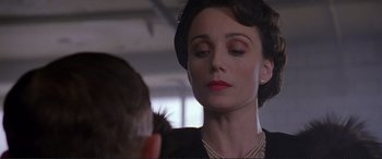 Movie still from “Richard III” (1995), directed by Richard Loncraine – A person with a bird on their shoulder; Close Up shot, Low angle