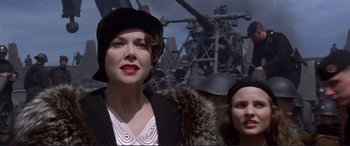 Movie still from “Richard III” (1995), directed by Richard Loncraine – A woman in a black hat and a woman in a black dress; Close Up shot, Low angle