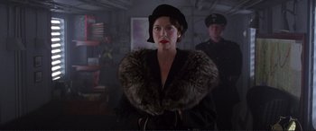 Movie still from “Richard III” (1995), directed by Richard Loncraine – A woman wearing a hat and a fur coat; Medium shot, Low angle