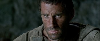 Movie still from “Risen” (2016), directed by Kevin Reynolds – A person with green eyes; Close Up shot, Over the shoulder angle