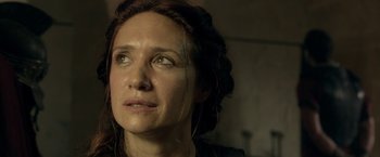 Movie still from “Risen” (2016), directed by Kevin Reynolds – A person looking at the camera; Close Up shot, Low angle