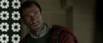 Movie still from “Risen” (2016), directed by Kevin Reynolds – A person wearing a suit of armor; Close Up shot, Low angle