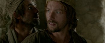 Movie still from “Risen” (2016), directed by Kevin Reynolds – A person with a beard; Close Up shot, Over the shoulder angle