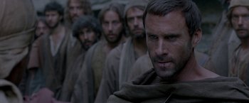 Movie still from “Risen” (2016), directed by Kevin Reynolds – A group of men standing next to each other; Close Up shot, Over the shoulder angle