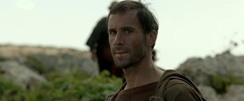 Movie still from “Risen” (2016), directed by Kevin Reynolds – A person with a beard; Close Up shot, Over the shoulder angle
