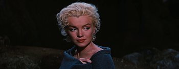 Movie still from “River of No Return” (1954), directed by Otto Preminger – A person with blonde hair; Close Up shot, Over the shoulder angle