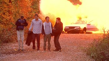 Movie still from “Road Trip” (2000), directed by Todd Phillips – A group of young men standing next to each other; Wide shot, Low angle