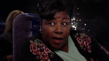 Movie still from “Road Trip” (2000), directed by Todd Phillips – A person wearing a jacket; Close Up shot, High angle