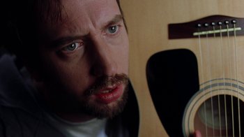 Movie still from “Road Trip” (2000), directed by Todd Phillips – A person with a beard; Extreme Close Up shot, Low angle