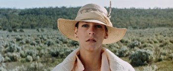 Movie still from “Road Games” (1981), directed by Richard Franklin – A person wearing a hat; Close Up shot, Low angle