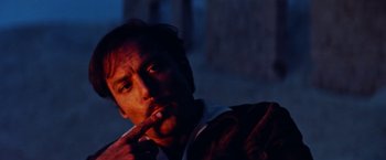 Movie still from “Road Games” (1981), directed by Richard Franklin – A person brushing his teeth; Close Up shot, Low angle