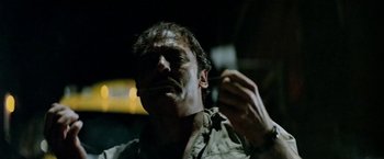 Movie still from “Road Games” (1981), directed by Richard Franklin – A person brushing his teeth; Close Up shot, Low angle