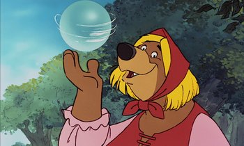 Movie still from “Robin Hood” (1973), directed by David Hand – A cartoon of a dog holding a ball in his hand; Medium shot, Low angle