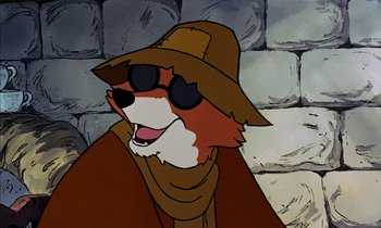 Movie still from “Robin Hood” (1973), directed by David Hand – A cartoon of a fox wearing a hat and sunglasses; Close Up shot, High angle