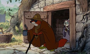 Movie still from “Robin Hood” (1973), directed by David Hand – An animated fox holding a pipe in front of a woman; Wide shot, Over the shoulder angle