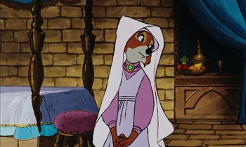 Movie still from “Robin Hood” (1973), directed by David Hand – A cartoon of a dog wearing a white robe; Medium shot, Over the shoulder angle