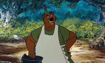 Movie still from “Robin Hood” (1973), directed by David Hand – A cartoon bear is holding a bucket in his hands; Medium shot, Low angle