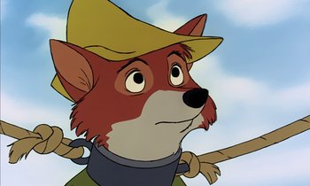 Movie still from “Robin Hood” (1973), directed by David Hand – A cartoon fox with a hat on; Close Up shot, Low angle