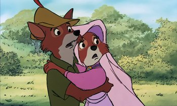 Movie still from “Robin Hood” (1973), directed by David Hand – An animated picture of a fox and a dog hugging each other; Close Up shot, High angle