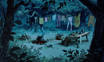 Movie still from “Robin Hood” (1973), directed by David Hand – A painting of a forest with clothes hanging on a line; Wide shot, High angle