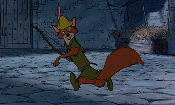 Movie still from “Robin Hood” (1973), directed by David Hand – A cartoon of an animal with a bow and arrow; Medium shot, Low angle